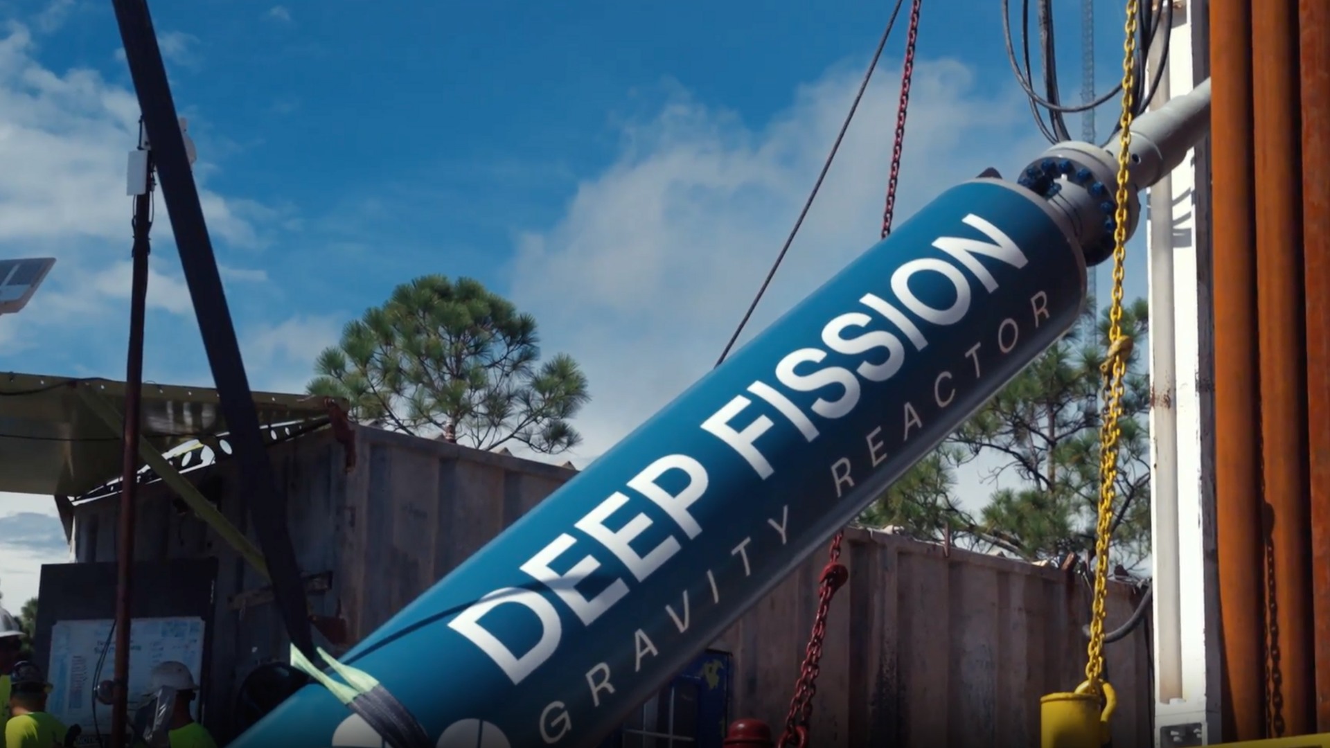 A deep drilling rig standing against an industrial sky, evoking the borehole engineering that underpins proposals to site small nuclear reactors roughly a mile below the surface