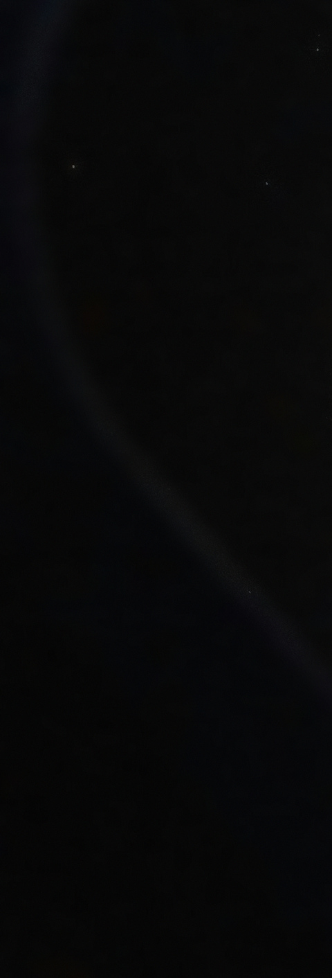 Earth from orbit, Australia and the Pacific under cloud, city lights on the night side