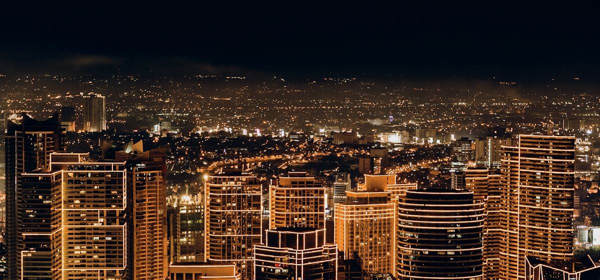 City skyline at night, aerial view
