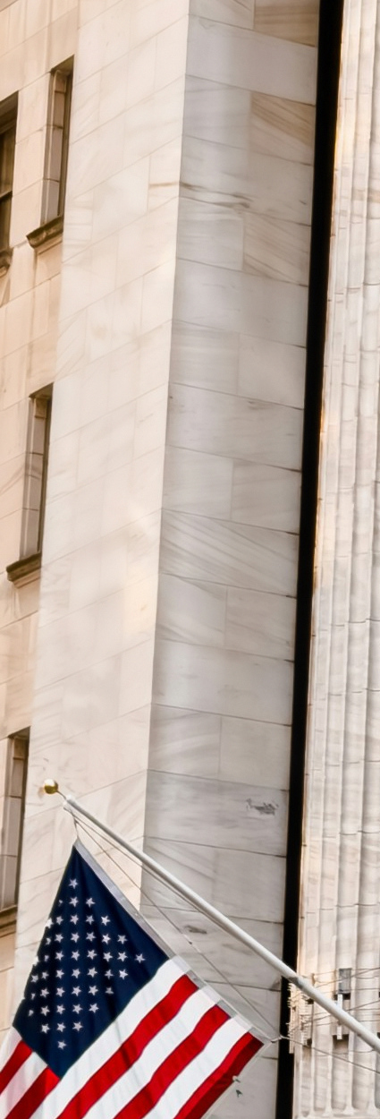 New York Stock Exchange facade, Corinthian columns and American flags